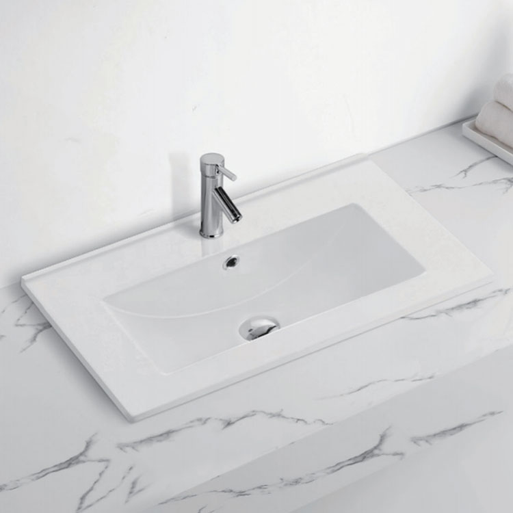 Bagaimana cara memperbaiki dan merawat goresan pada wastafel kamar mandi keramik saya?